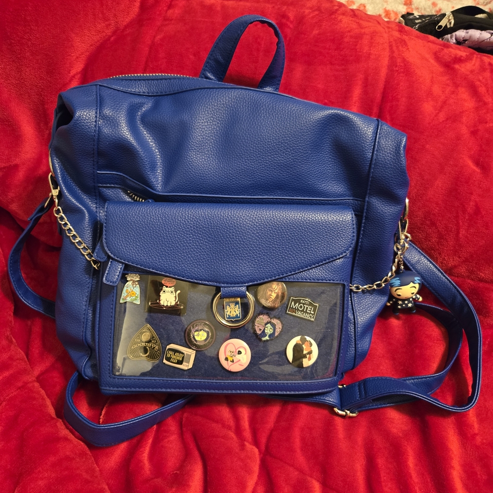 Blue Convertible Backpack With Pin Holder